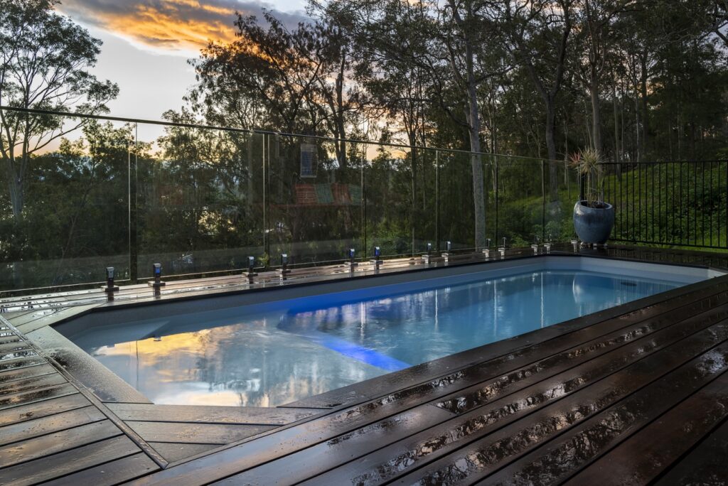 small pool with elevated system from the Little Pool Co for use in sloped backyard